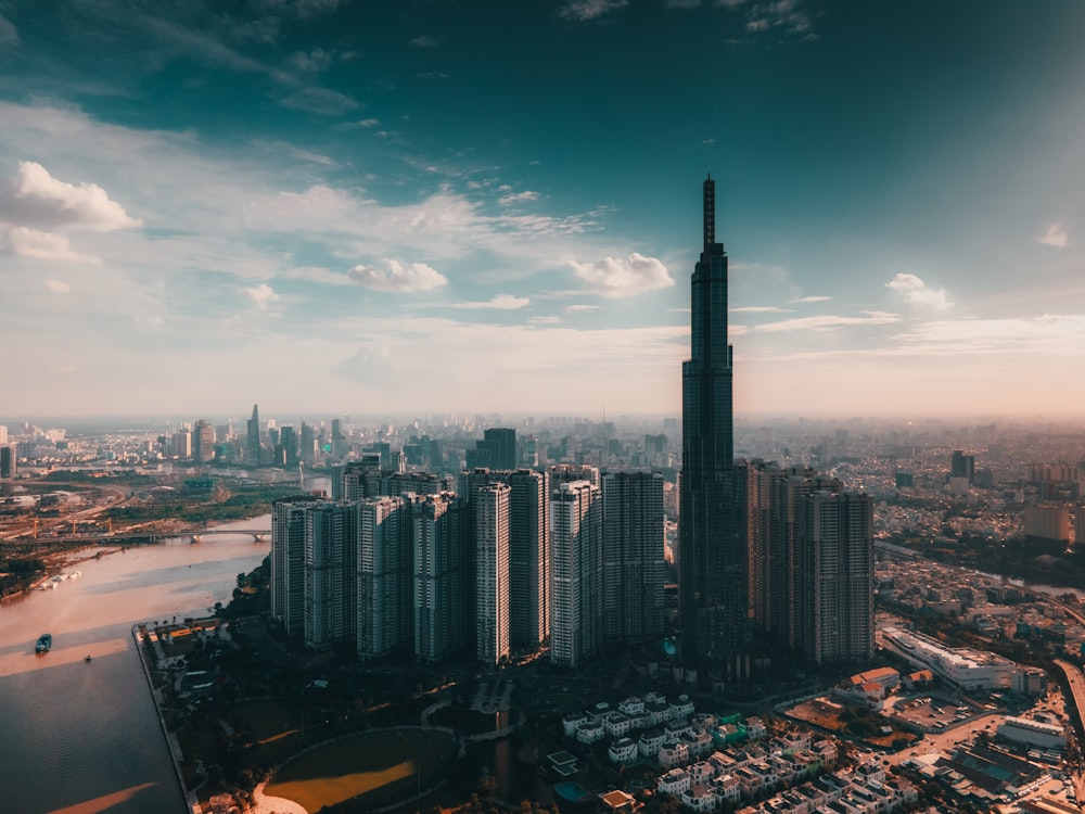 city skyline under blue sky during daytime