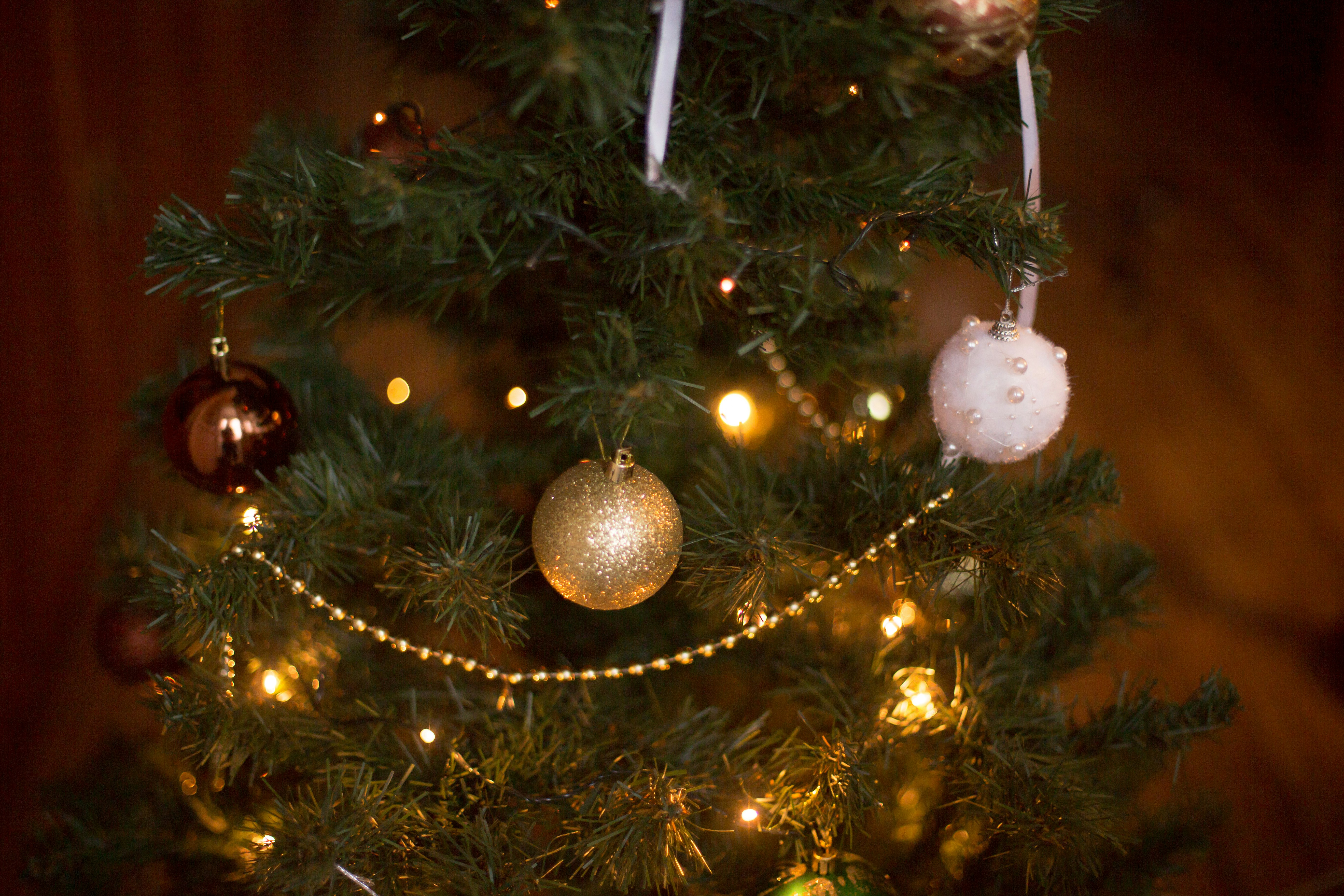gold and silver baubles on christmas tree