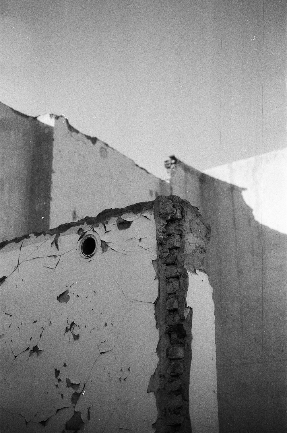 grayscale photo of concrete wall