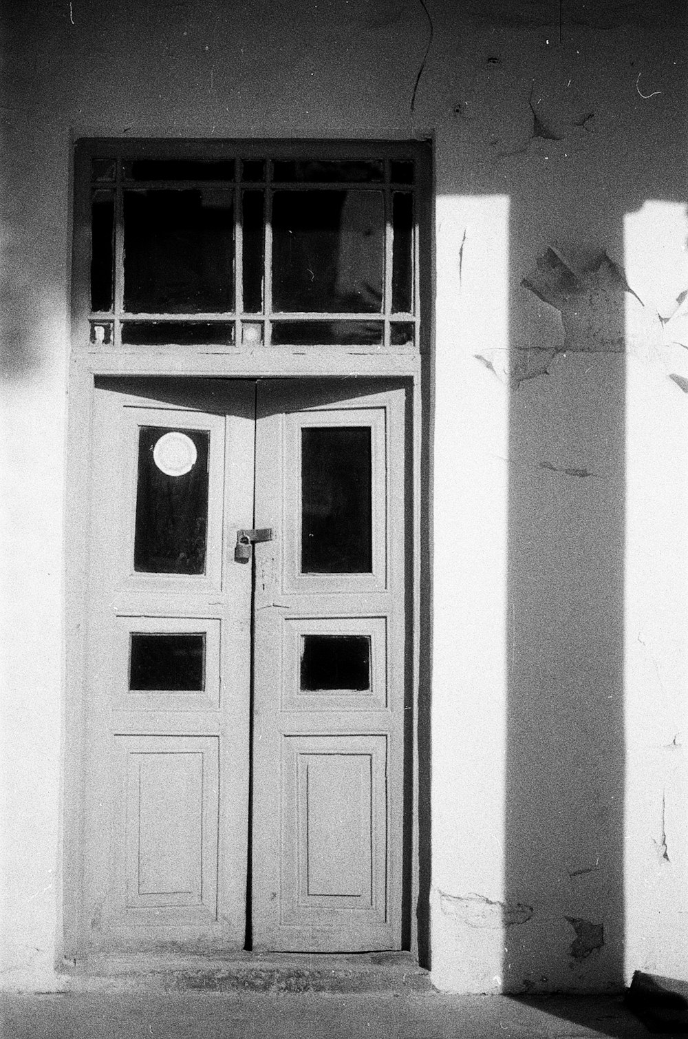 white wooden door with heart shaped wall decor