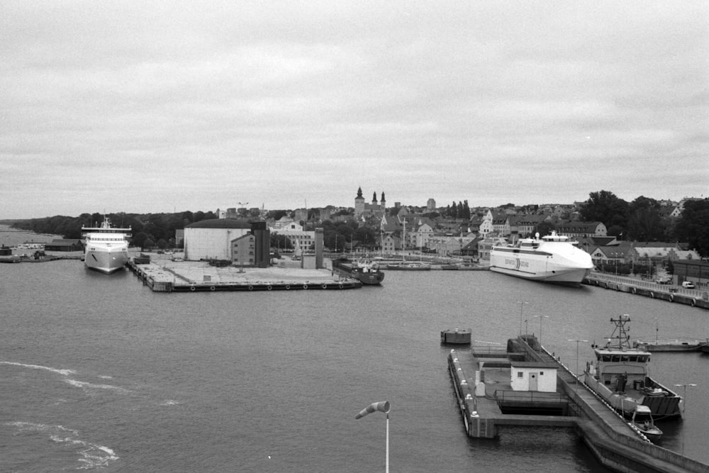 grayscale photo of boat on water