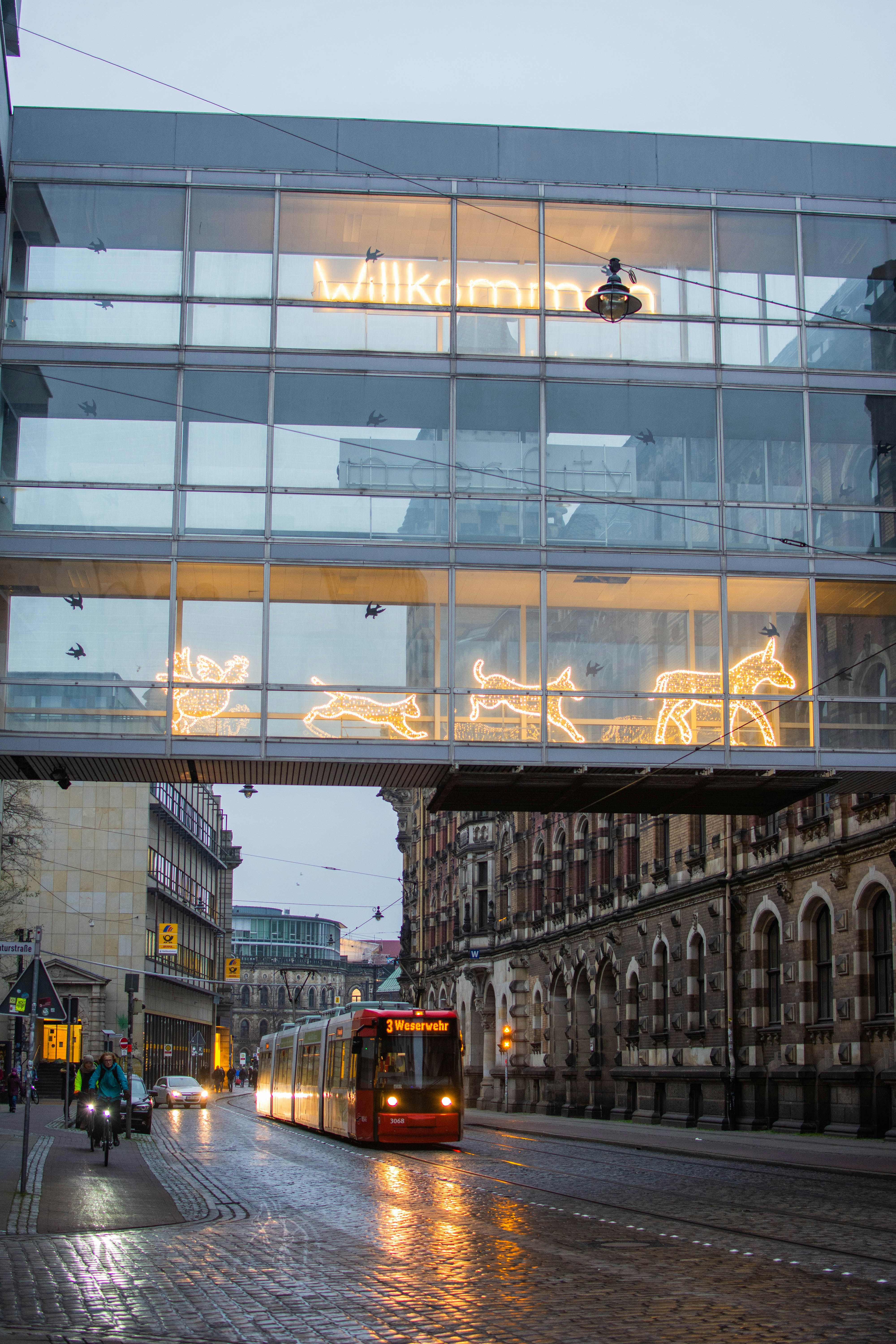cars on road near buildings during daytime