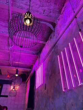 black pendant lamp turned on in room