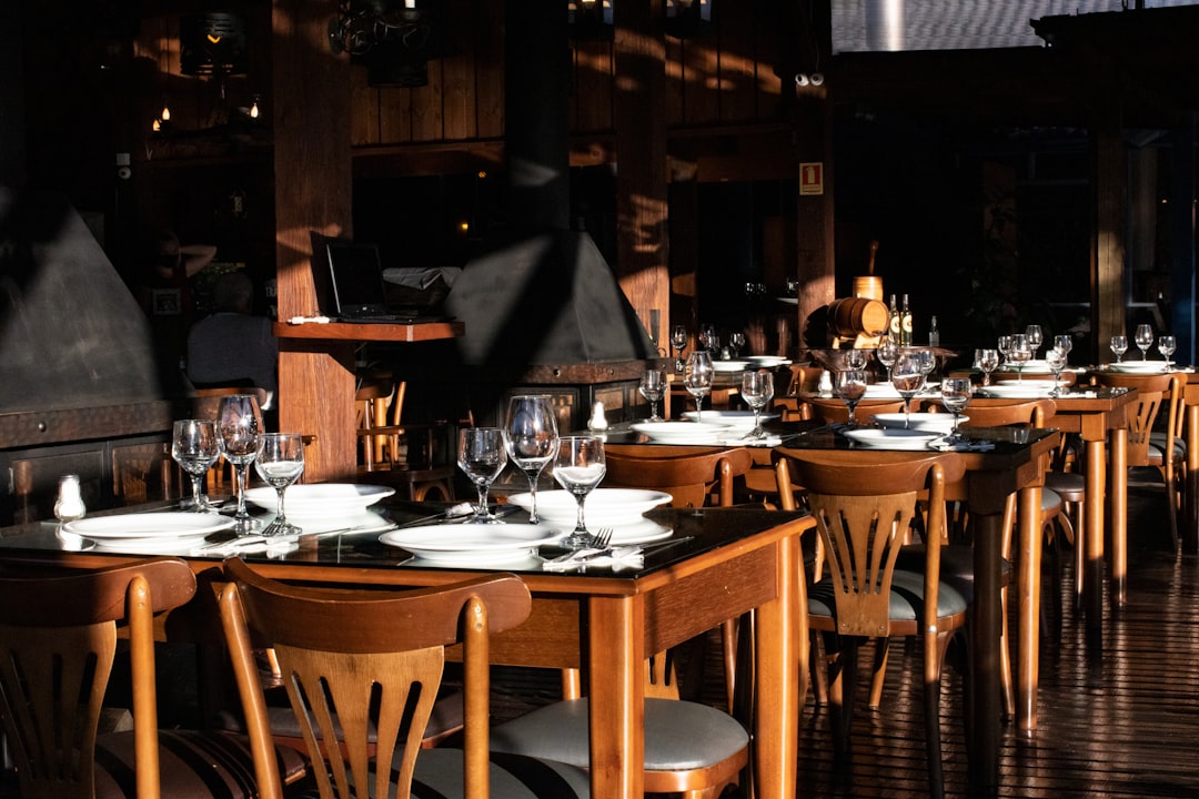 brown wooden table with chairs