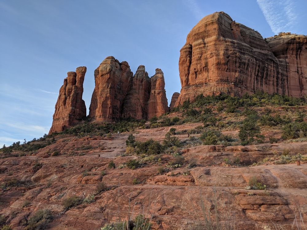 brown rock formation under blue sky during daytime