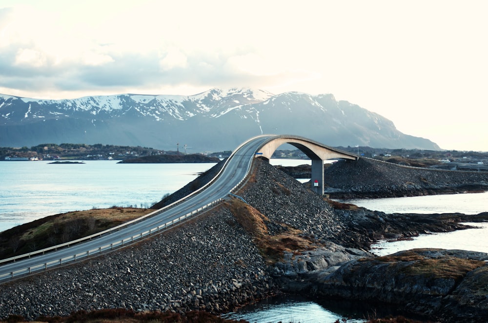 gray concrete bridge over the river