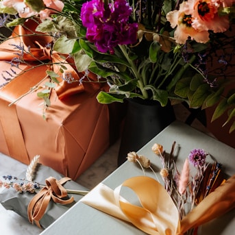 pink and yellow flowers on brown paper bag