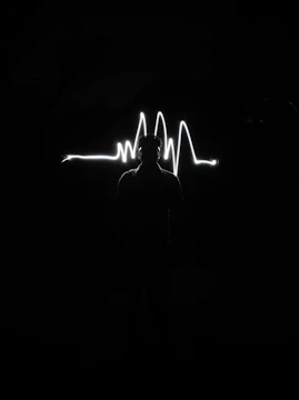 Soft pastel graphic showing a digital heartbeat line forming a mother’s profile.