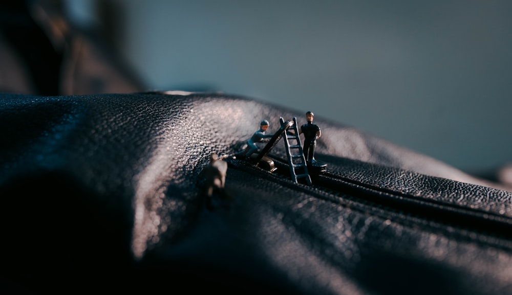 black leather textile with black zipper