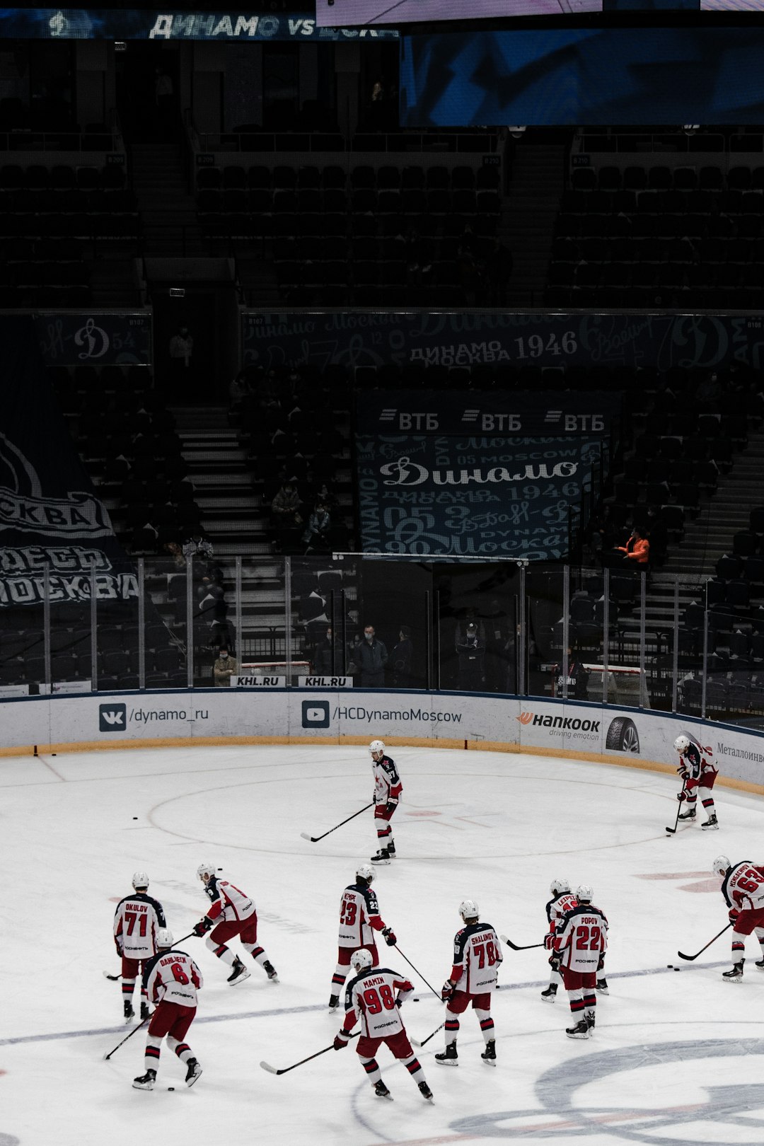 people playing ice hockey on stadium