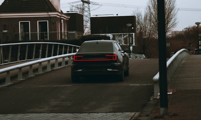 black car on road during daytime