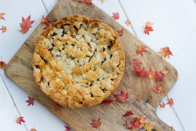 brown round food on brown wooden chopping board apple pie google meet background