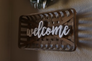 Close-up of a welcome basket with local treats and a handwritten note.