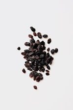 black round fruits on white background