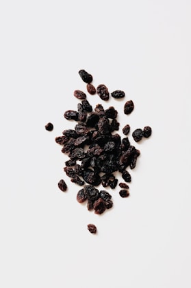 black round fruits on white background