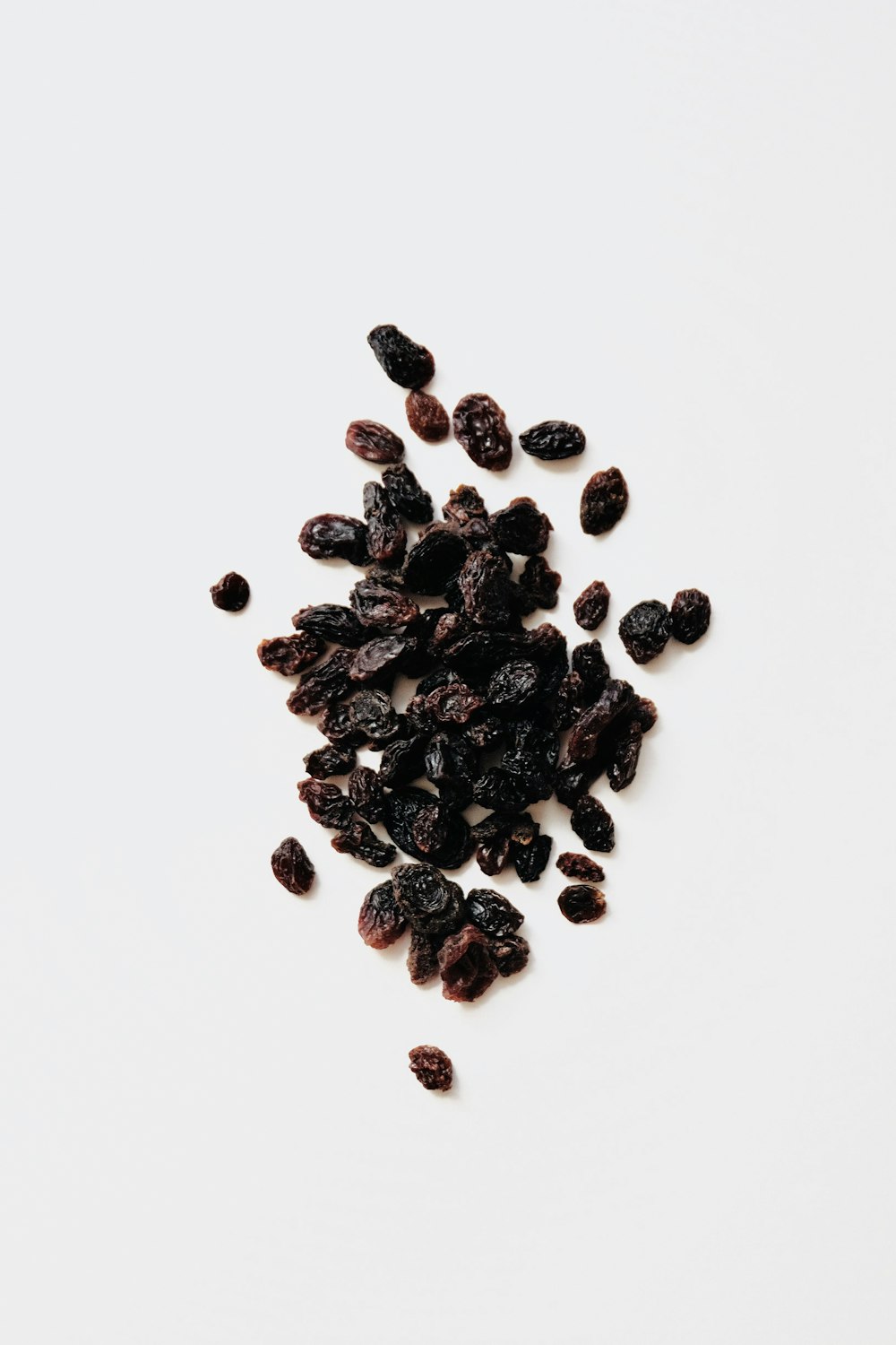 black round fruits on white background