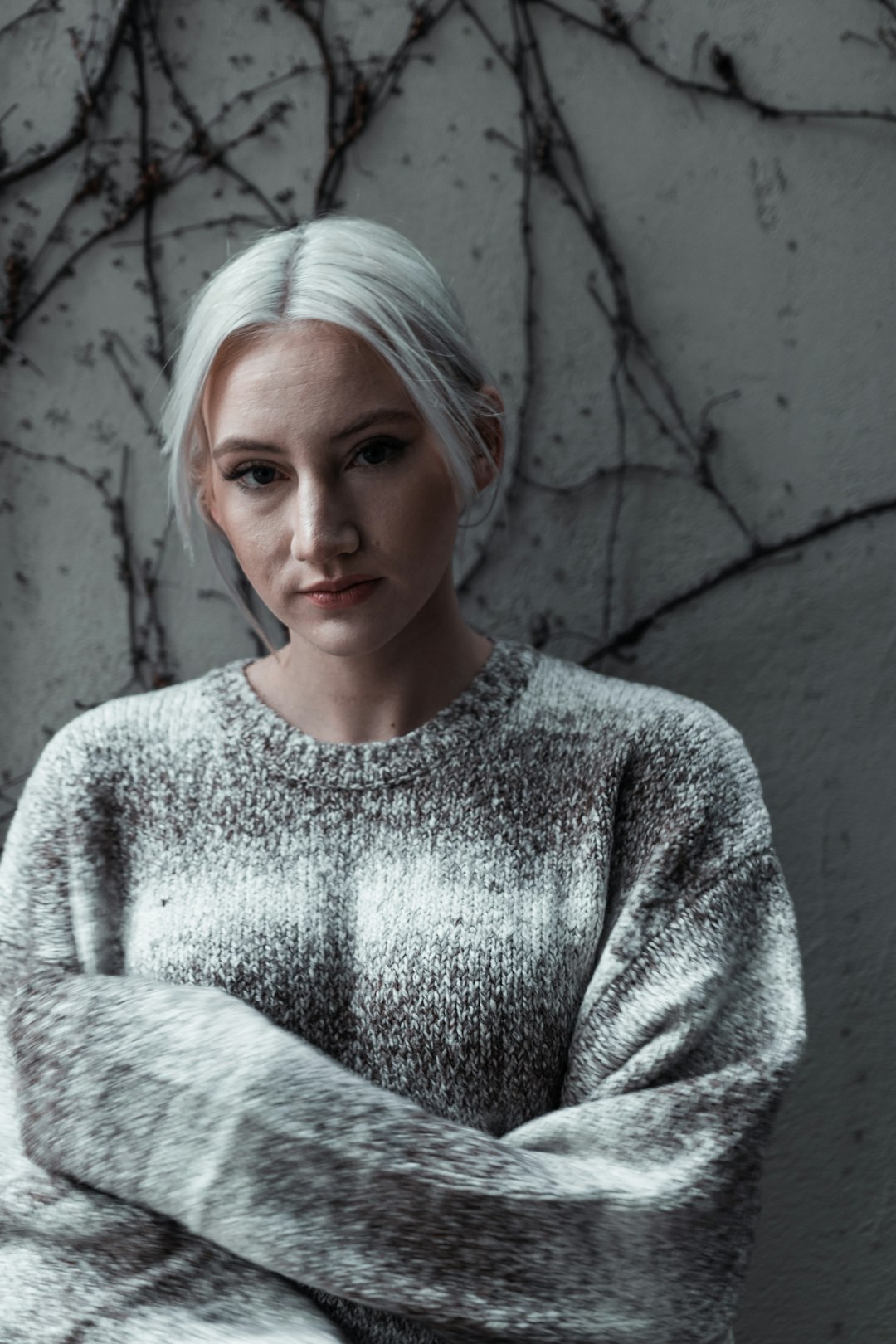 woman in gray knit sweater