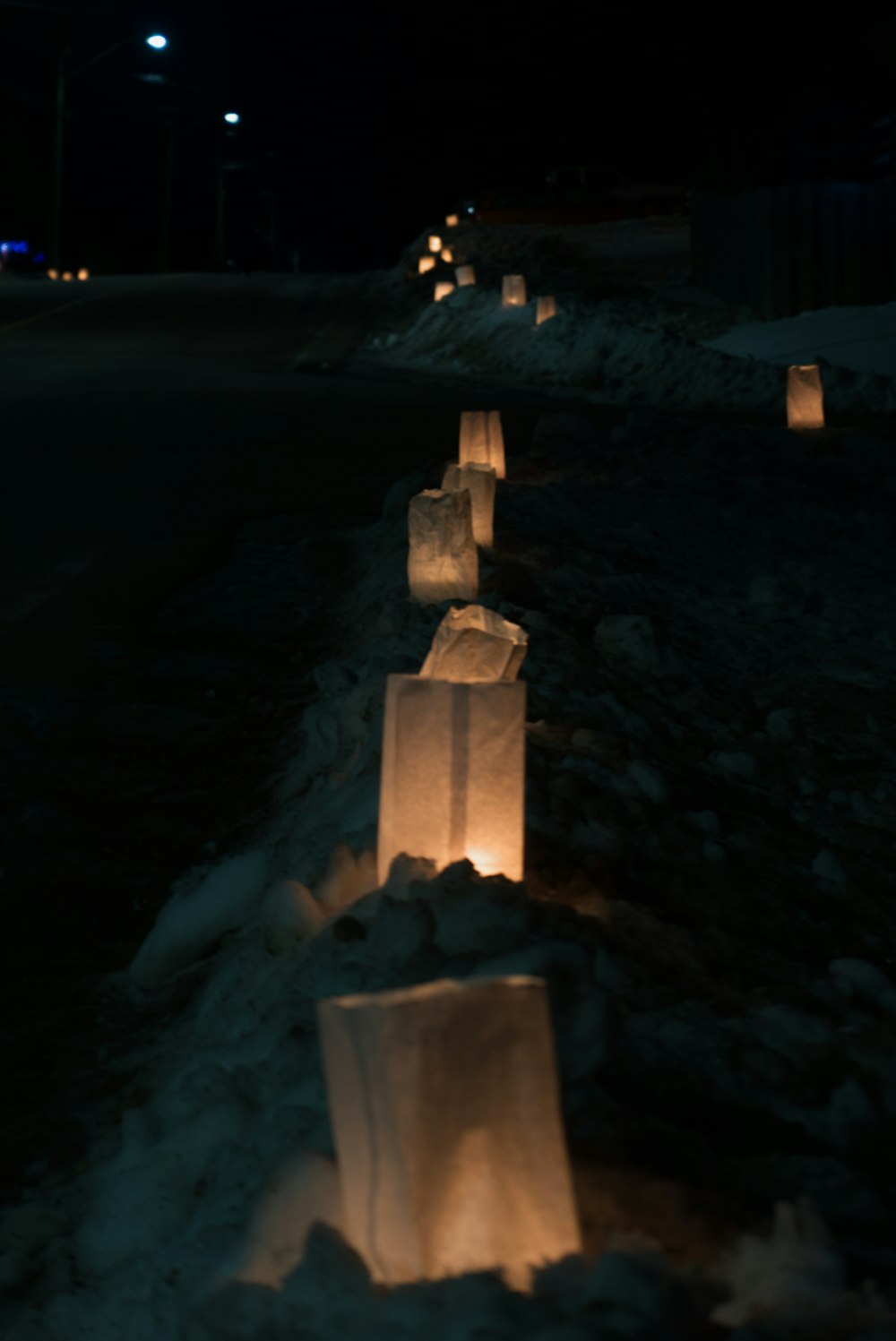 white concrete blocks on snow covered ground during night time