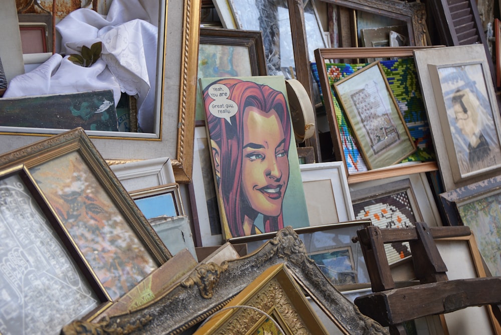 brown wooden framed painting of woman