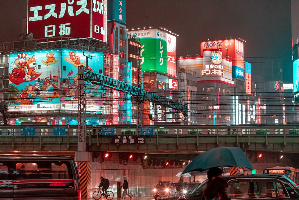 people walking on street during night time