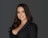 woman in black long sleeve shirt smiling
