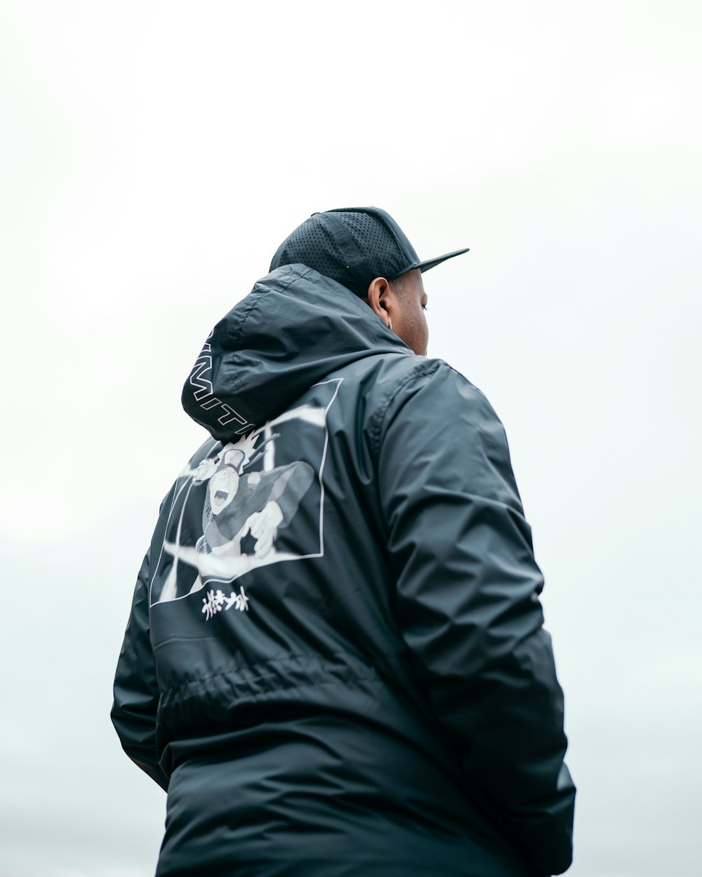 man in black and white hoodie