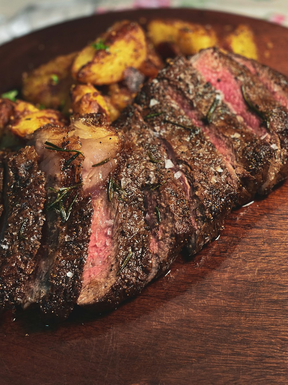 grilled meat on brown wooden table