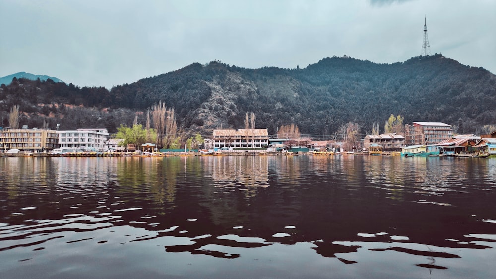 brown concrete building near body of water during daytime