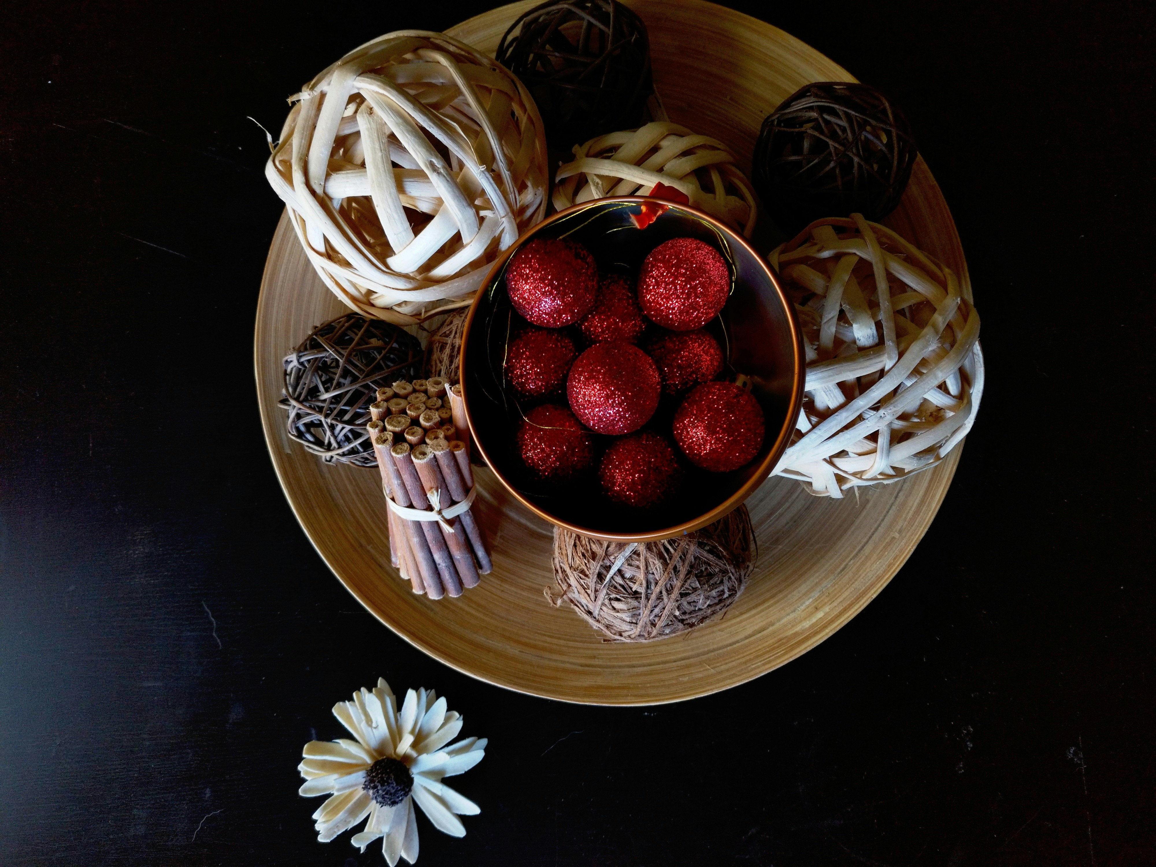 red strawberries on brown woven basket