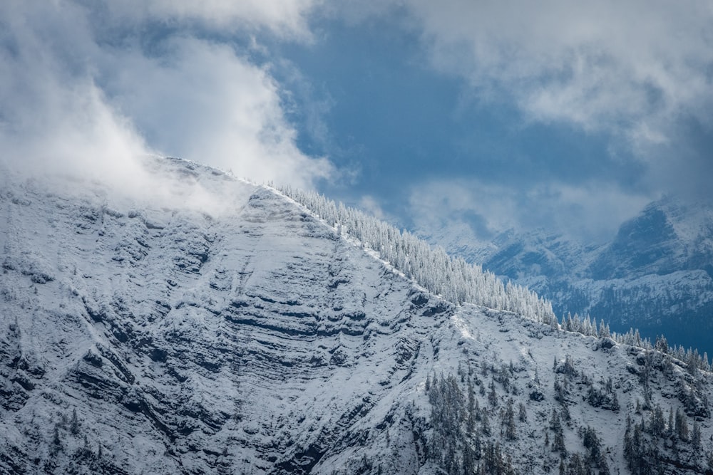 snow covered mountain under blue sky during daytime