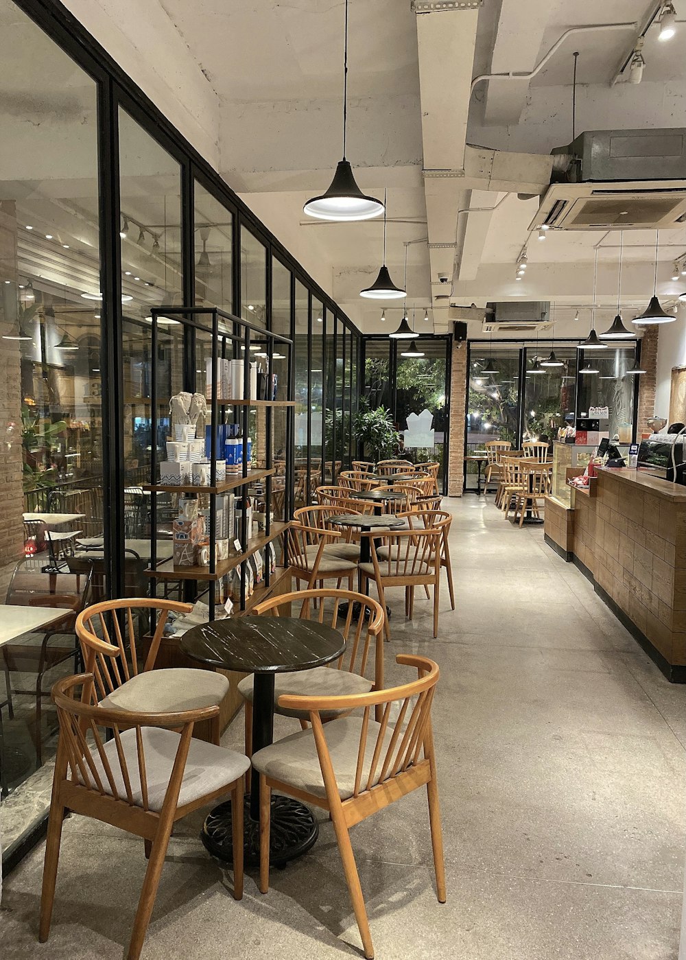 brown wooden chairs and tables