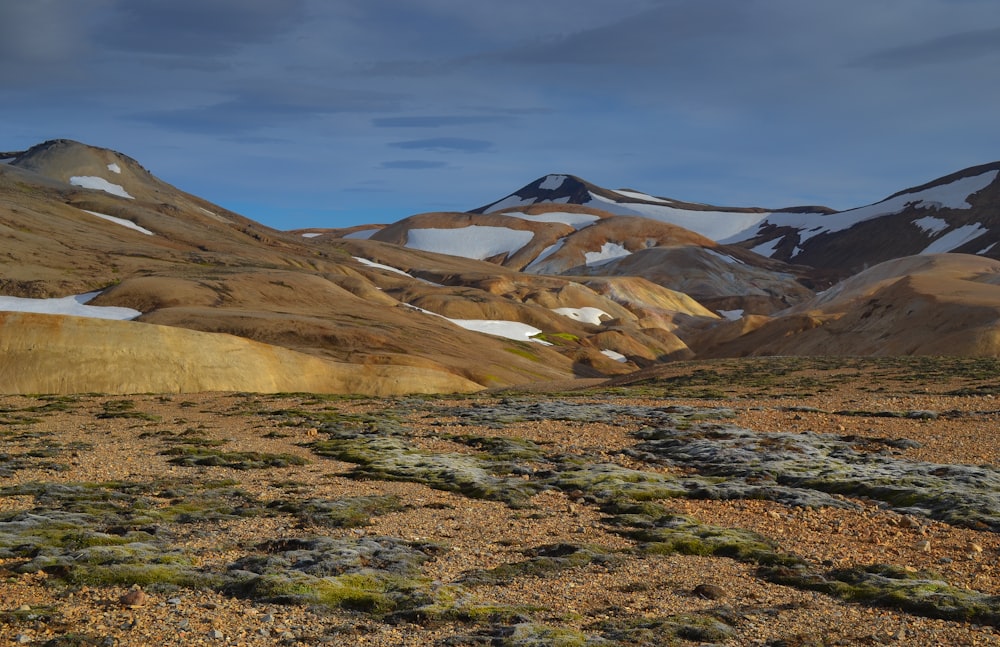 brown and gray mountains under blue sky during daytime