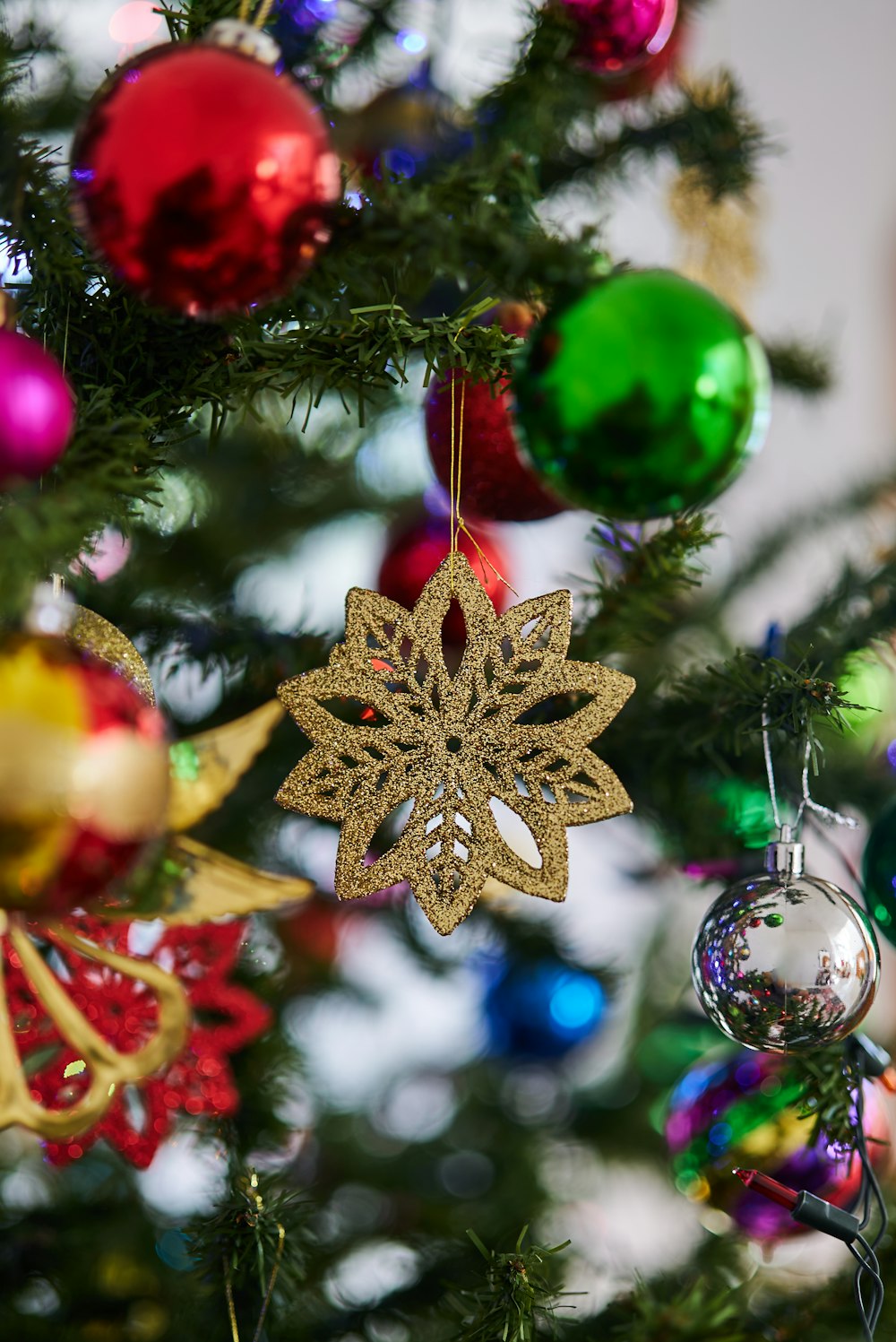 gold and green christmas baubles