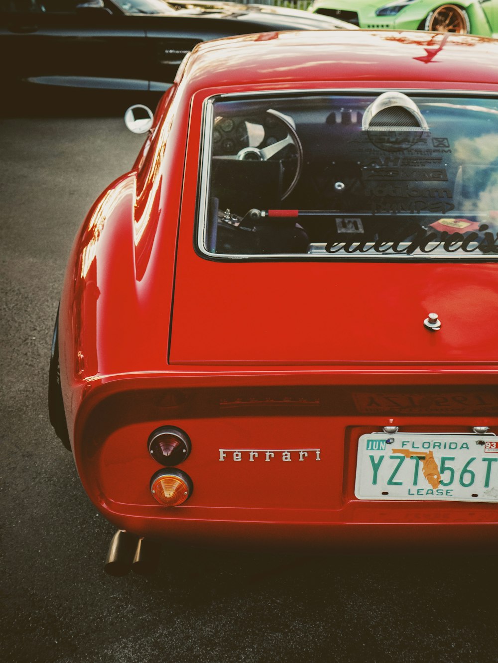 red porsche 911 on road during daytime