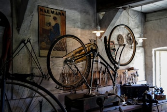 black city bike on black metal rack