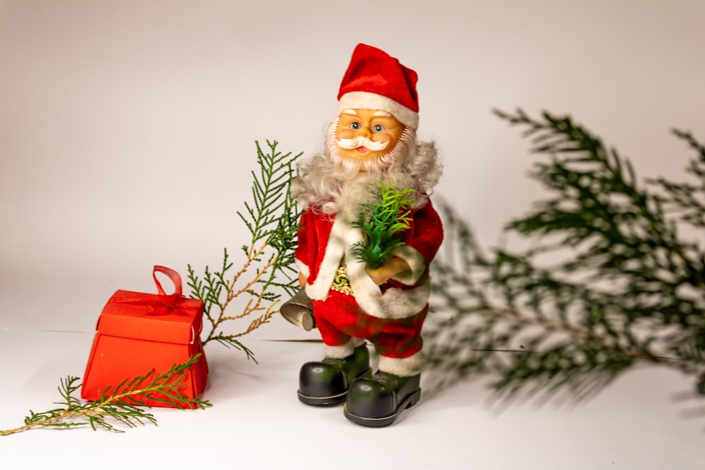 santa claus figurine on white table