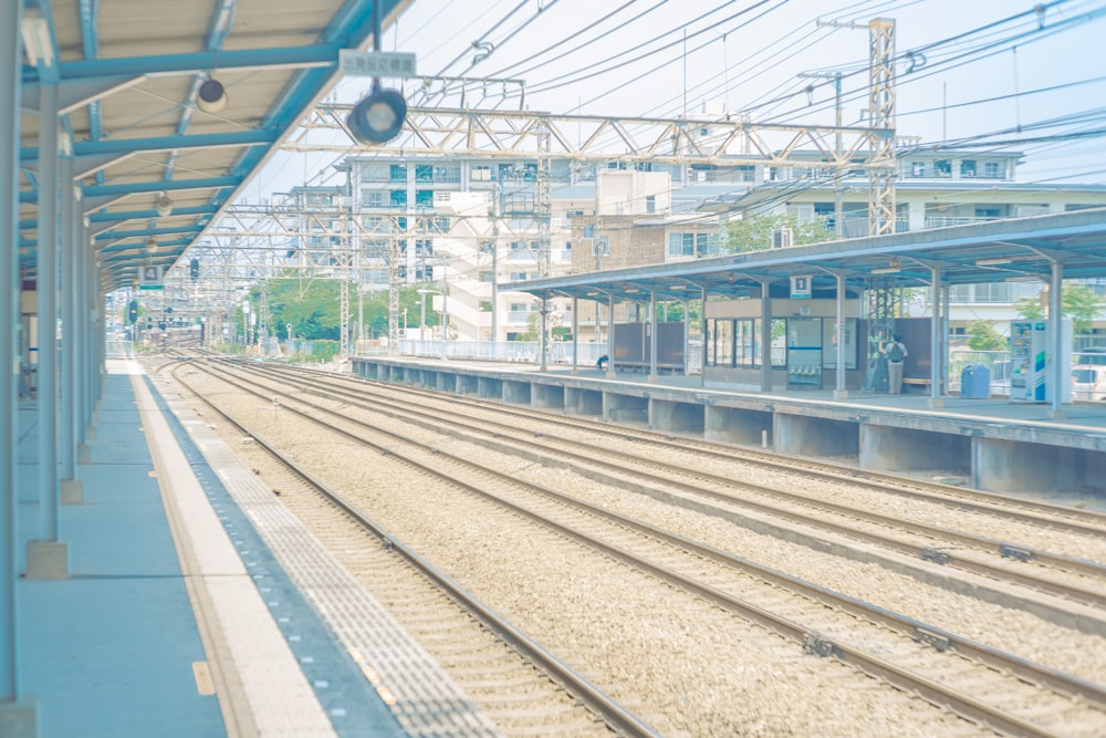 blue train on train station during daytime