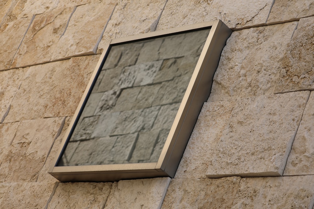 brown wooden framed glass window