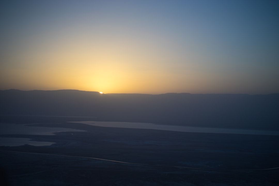 silhouette of mountains during sunset