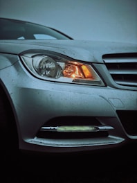 gray car with silver and black car tail light