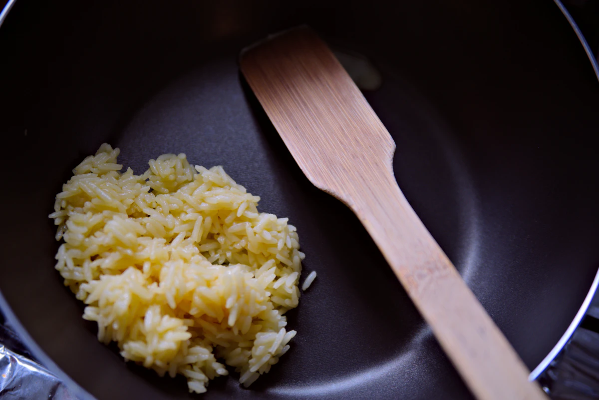 Golden yellow rice on a dark plate