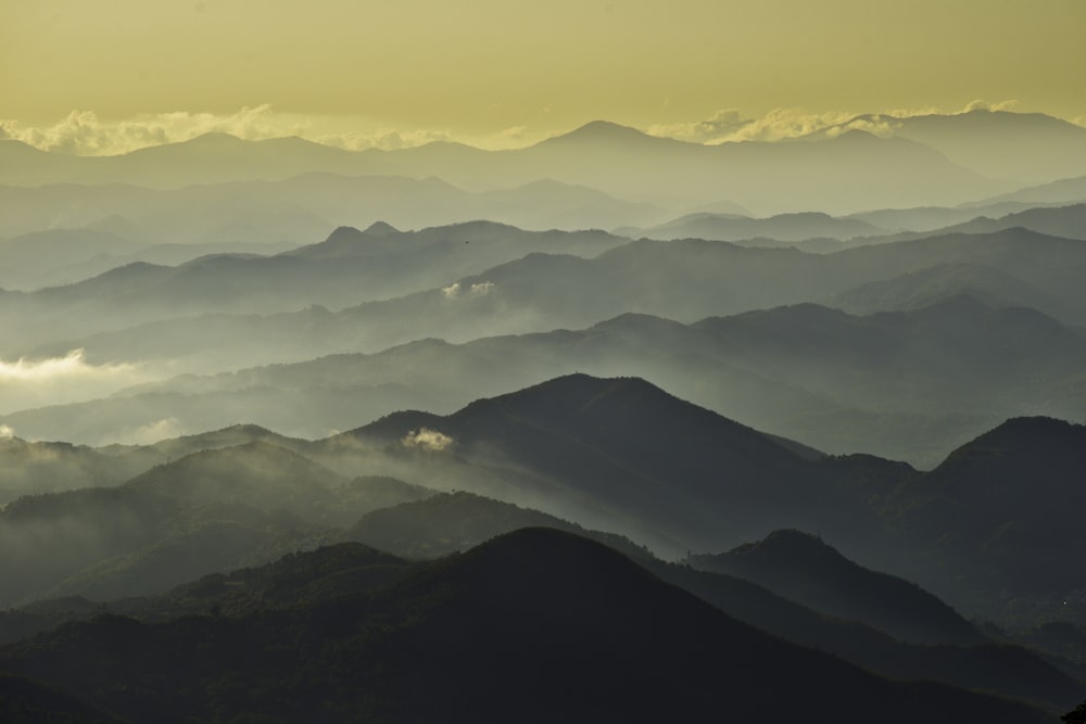 black mountains under white sky during daytime