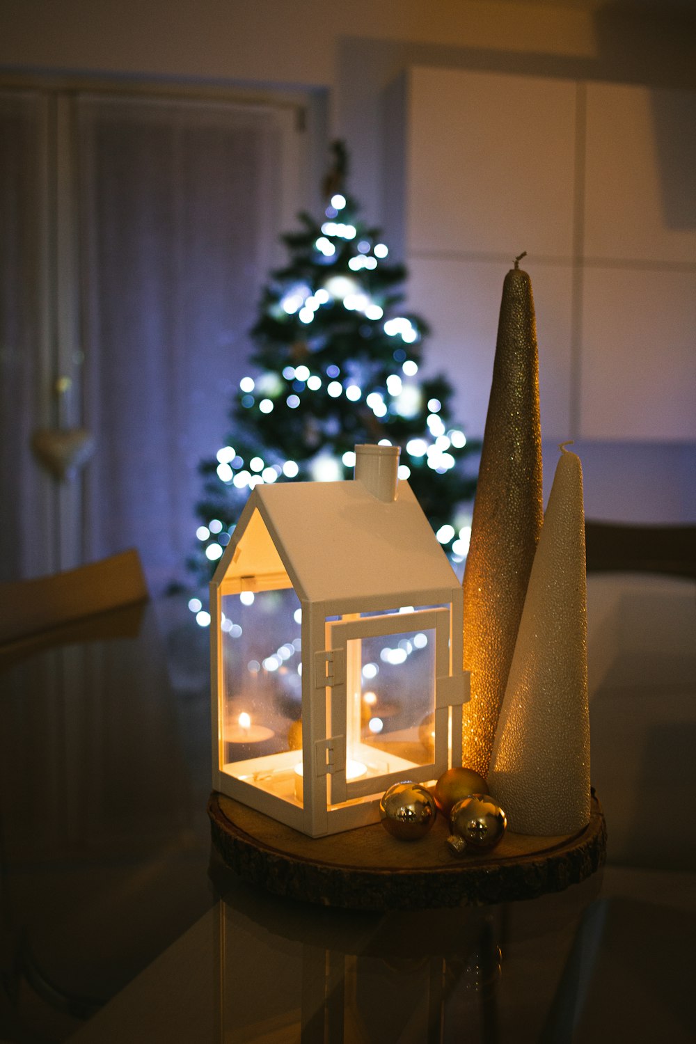 brown wooden candle holder on brown wooden table