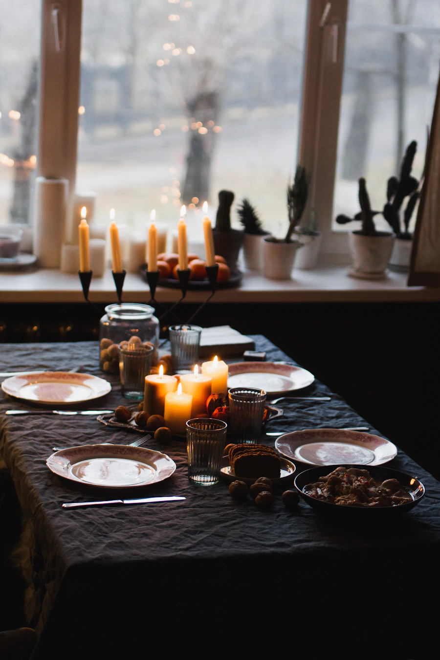 Lighted candles on a round table