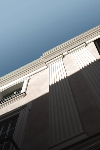 brown concrete building under blue sky during daytime