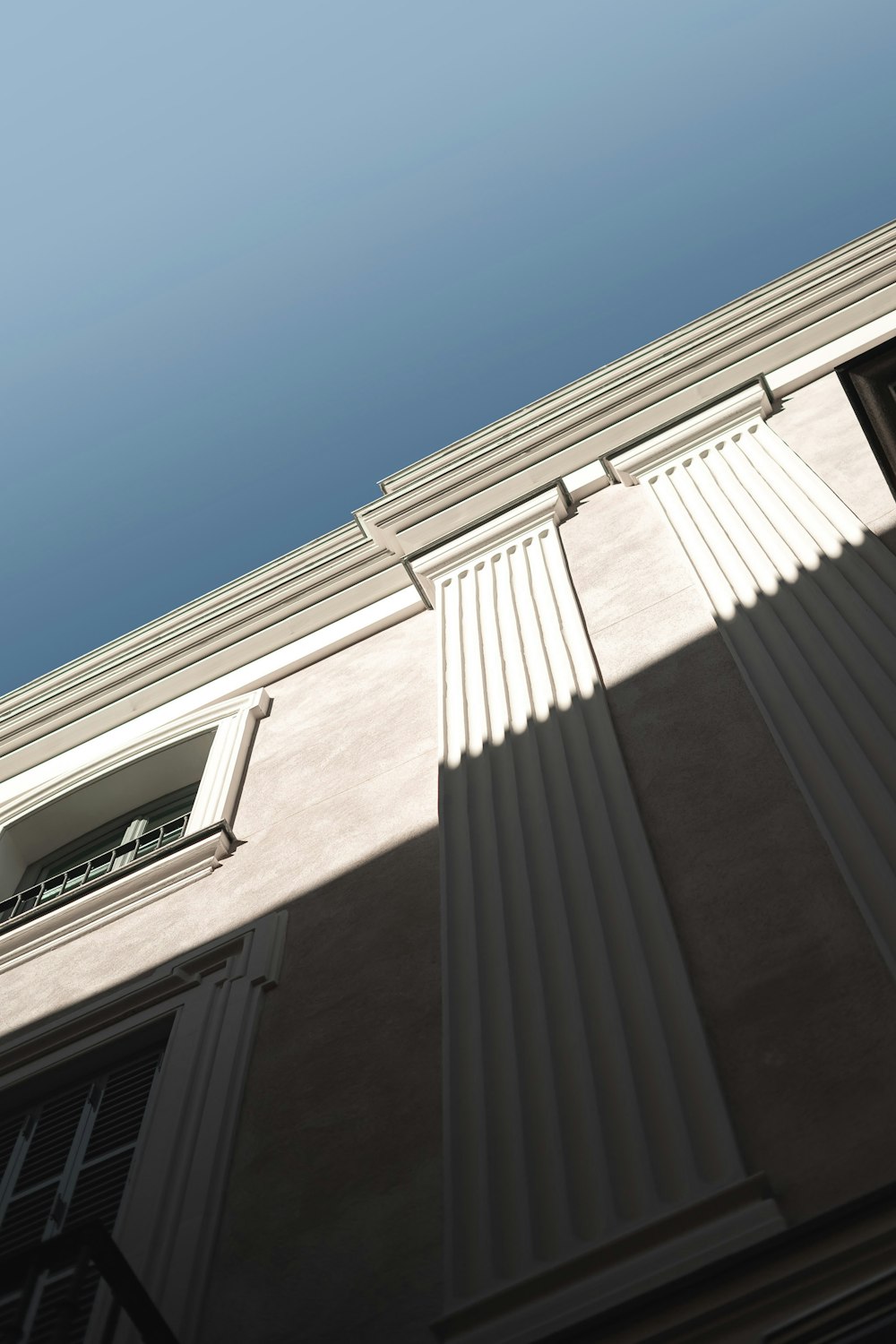 brown concrete building under blue sky during daytime