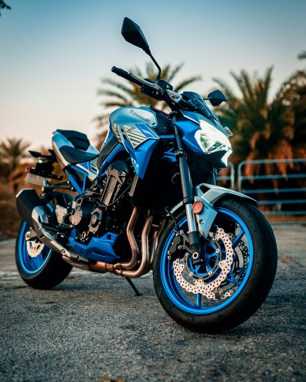 blue and black sports bike on road during daytime