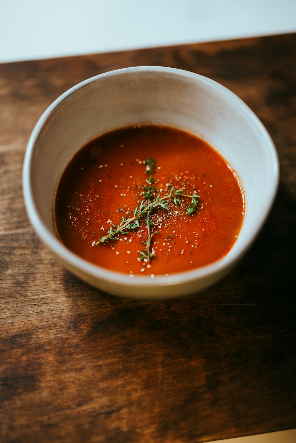 white ceramic bowl with soup