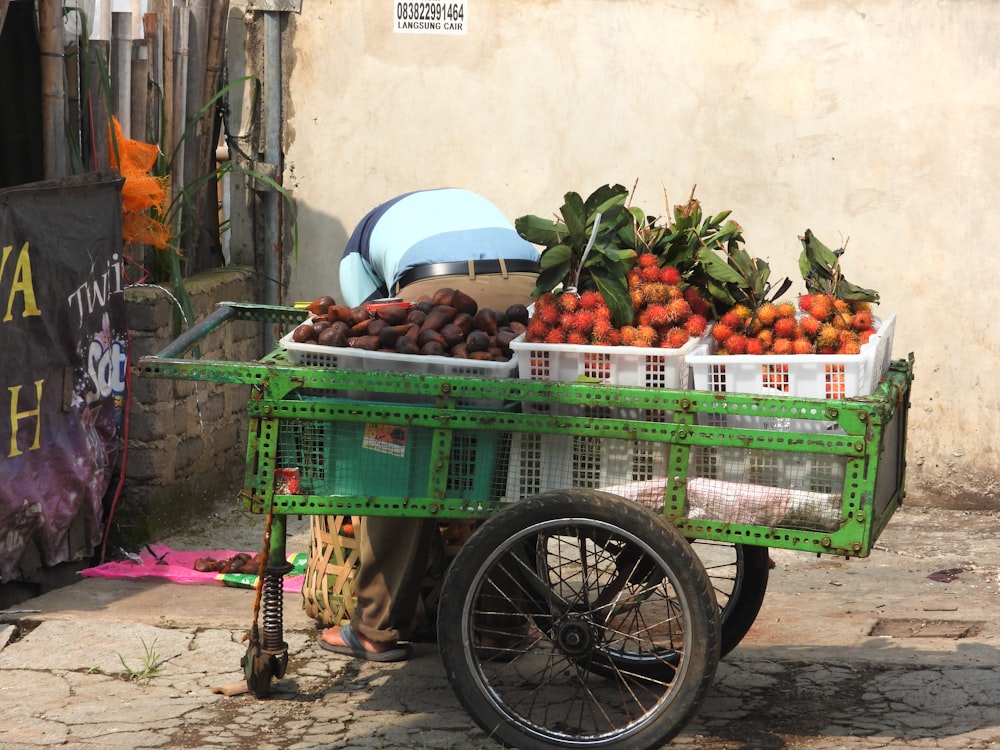 green plastic crate with fruits