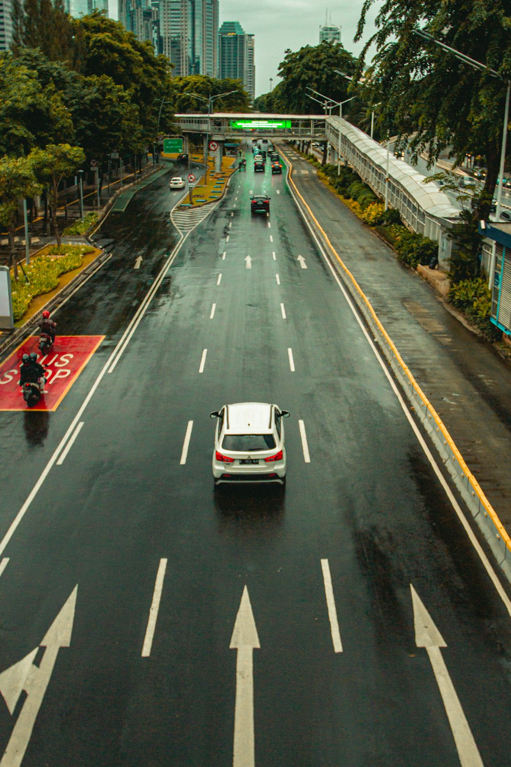 white car on road during daytime